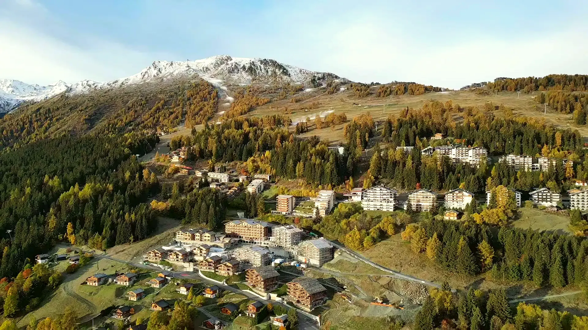 Les Collons in autumn from our drone, with the pistes rising towards Thyon